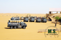 //iqrorwxhonpplm5m-static.micyjz.com/cloud/lkBpiKoklrSRiljnpjljjo/desert-cruiser-bus-in-tourism-area.jpg