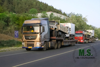 //iqrorwxhonpplm5m-static.micyjz.com/cloud/lrBpiKoklrSRjlikpmojjq/Chinese-tractor-truck-carrying-the-truck-to-ship-out.jpg